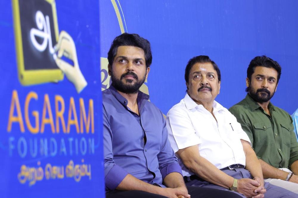 agaram-trust-actor-sivakumar-surya-karthi-photos